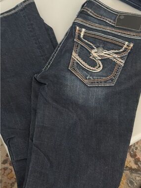 slivers jeans  ultra low 2010Dark Blue Skinny Jeans with Embroidered Back Pocket